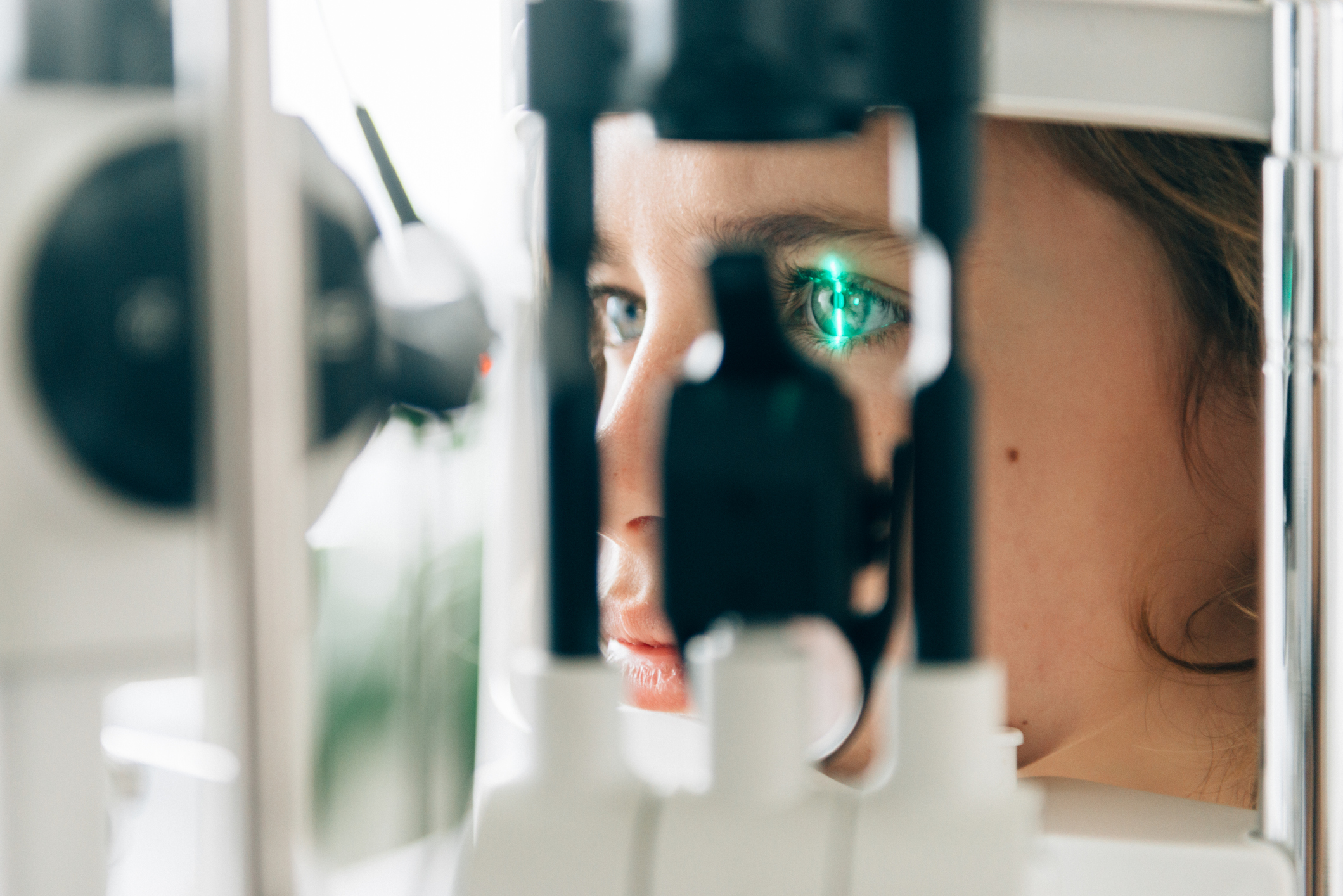 Patient at a slit lamp